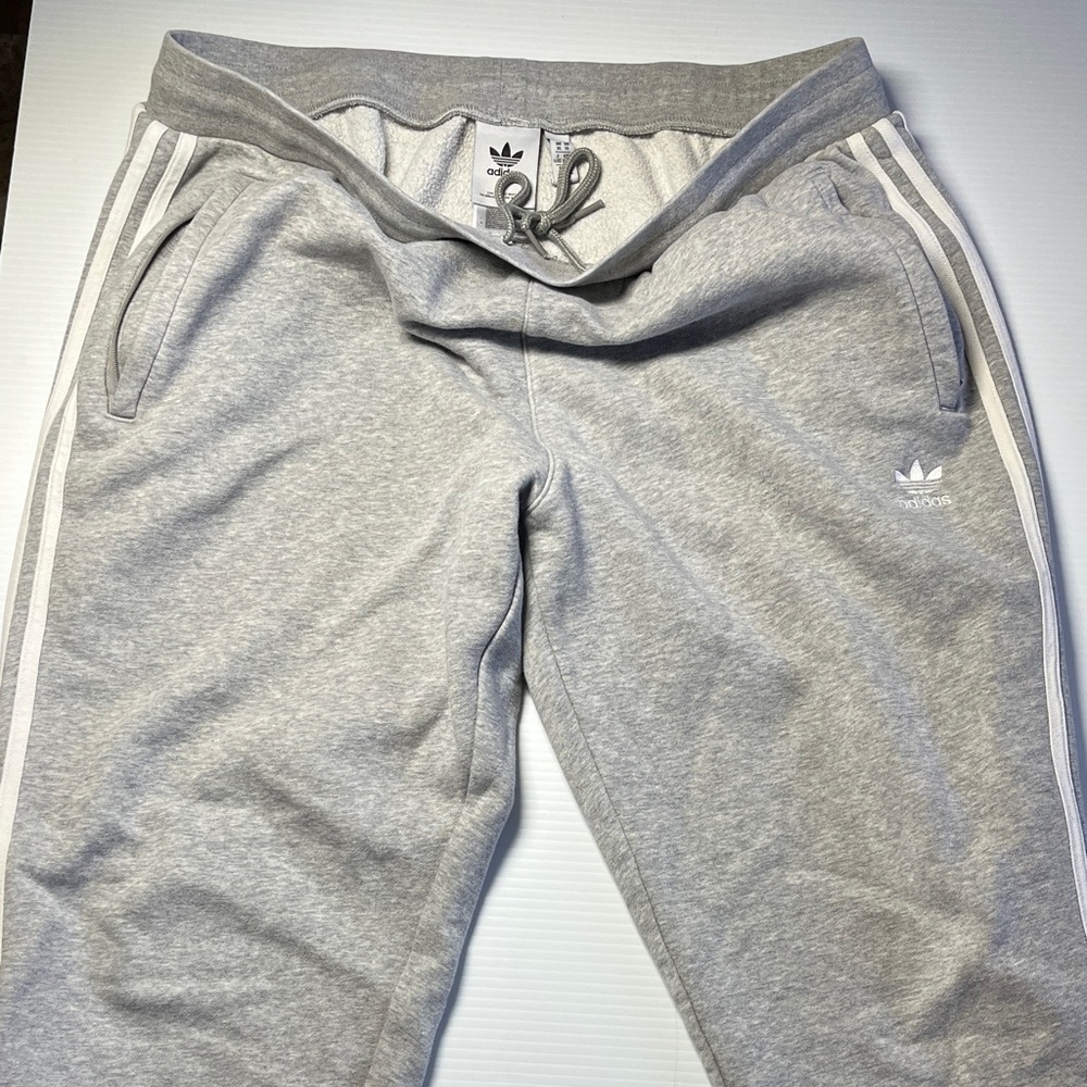 Adidas Men's Light Gray Joggers with White Stripes